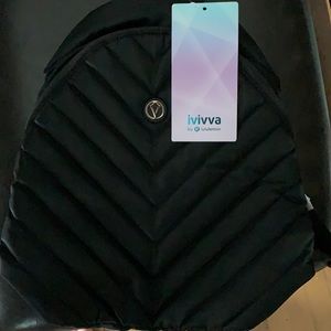 Brand new with tags Ivivva quilted back-pack style purse.